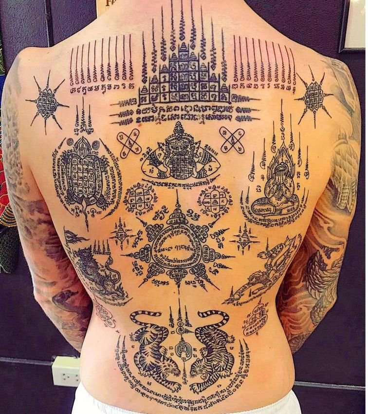 Thai Ancient Spells Tattoo Or Sak Yant An Traditional Blessed Tattoo With  Khmer Language Script Meaning Bless For Lucky And Fortune Most Popular In Muay  Thai Fighters Ayutthaya March 2018 Thailand Stock